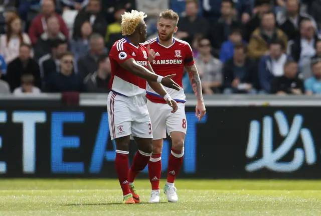 Adama Traore and Adam Clayton