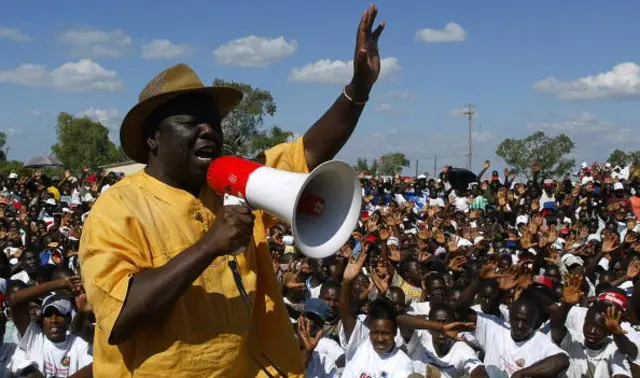 Morgan Tsvangirai, leader of Zimbabwe's main opposition party Movement for Democratic Change (MDC) greets people during a campaign meeting at a rally in Domboshava 40 km north of Harare, on March 28, 2008