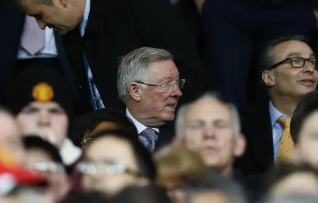 Sir Alex Ferguson sat in the stands