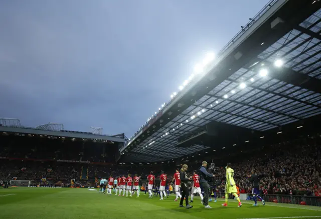 Players walk out