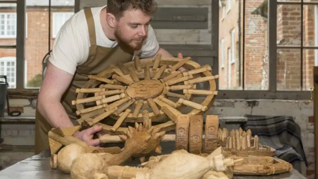 Wood carver Alec Stevens' installation