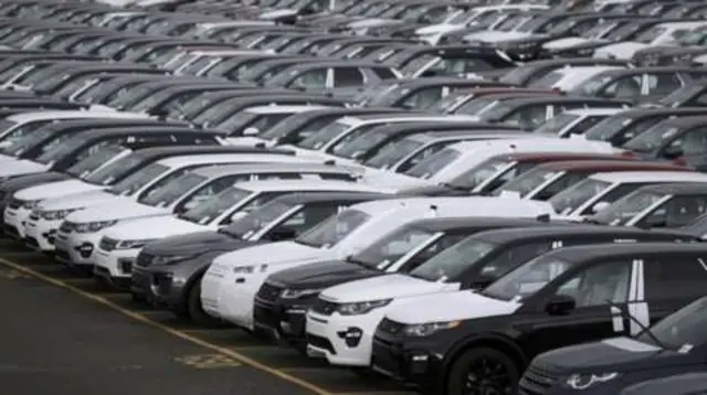 Land Rovers lined up