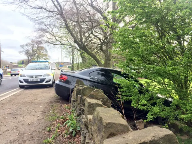 Car in wall