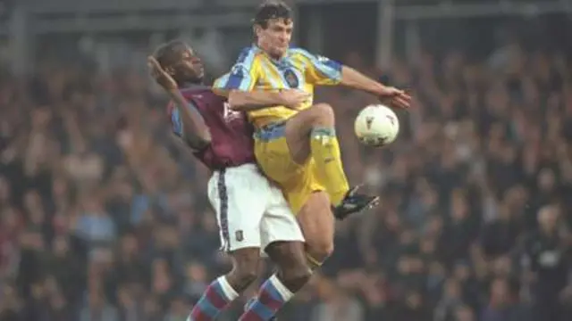 Ehiogu and Hughes in action