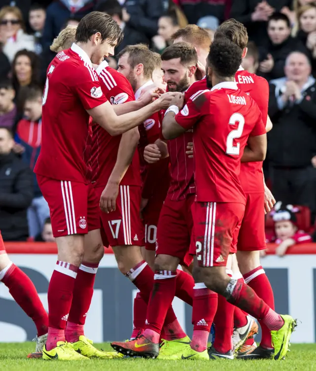 Aberdeen's Graeme Shinnie (centre) celebrates his Scottish Cup winner against Partick Thistle