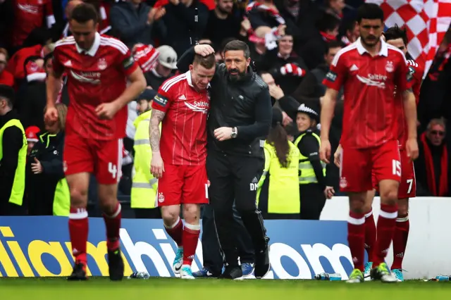 Aberdeen boss Derek McInnes congratulates Jonny Hayes