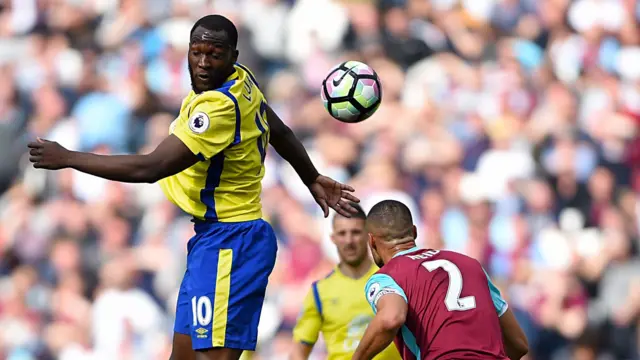 Romelu Lukaku heads at goal