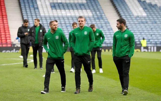 Hibs players enjoy a stroll on the famous Hampden turf