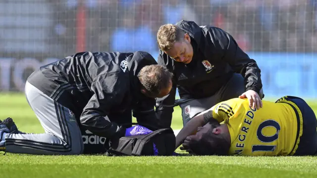 Alvaro Negredo is treated for a head injury