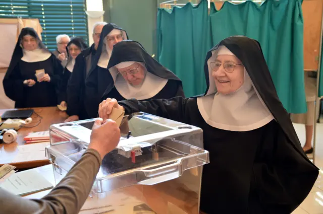 Benedictine sisters cast their election ballots in Solesmes, northwestern France