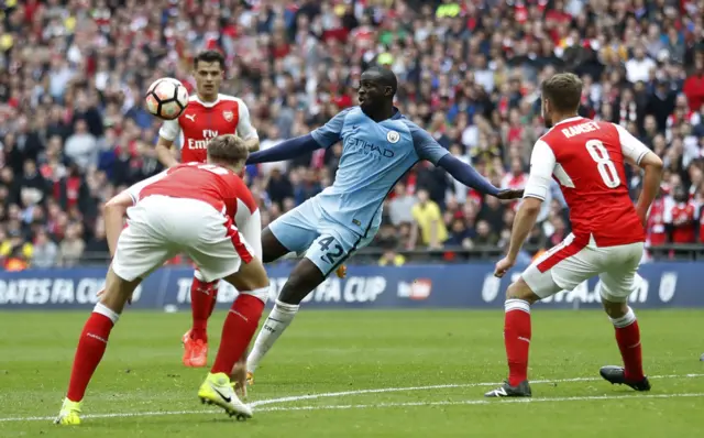 Toure hits the post