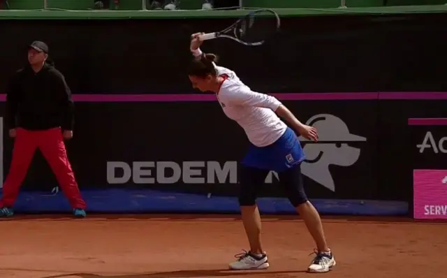 Begu throws racket