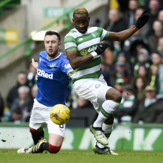 Danny Wilson tackles Celtic striker Moussa Dembele