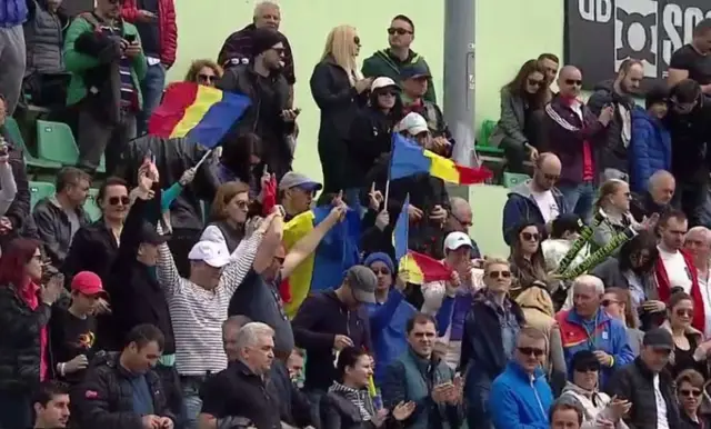 Romanian fans cheer on Begu