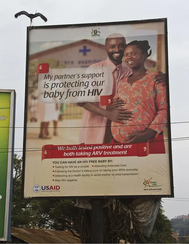 A photo taken on January 20, 2014 shows a billboard encouraging people to take HIV tests in Kampala. AFP PHOT