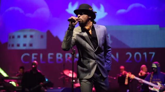 Andre Cymone performs with New Power Generation