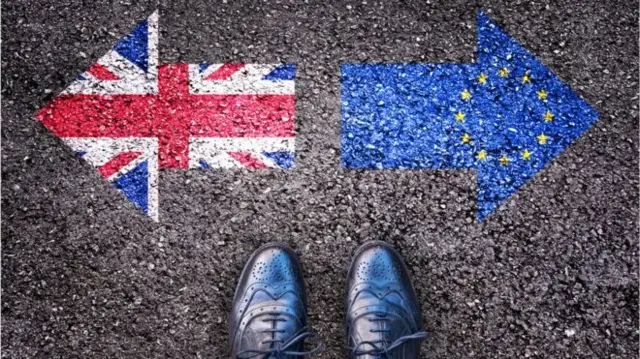 Pavement flags as arrows union jack and EU