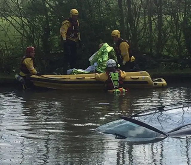 Firefighters rescuing man