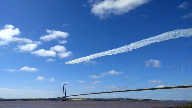 Red Arrows flying over Humber Bridge