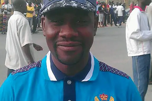 This handout picture provided by French public radio RFI on July 30, 2016 shows RFI reporter Ahmed Abba in Maroua, Cameroon, posing in the streets.