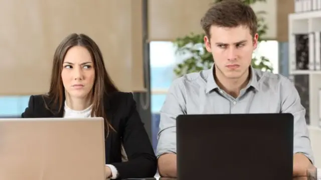 People sitting at laptops