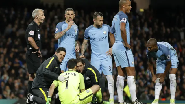 Manchester City's Bravo comes off injured