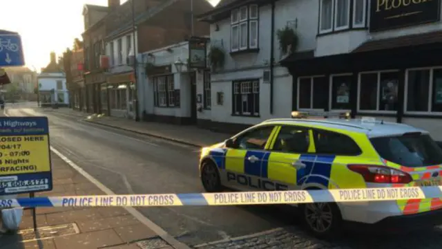 Police tape in Dogs Head Street