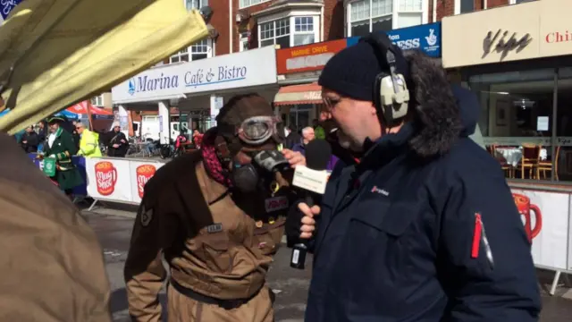 Person dressed as aviator