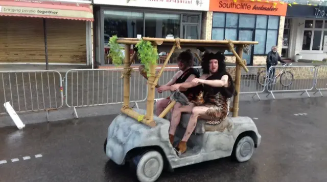 Two men dressed as cavemen