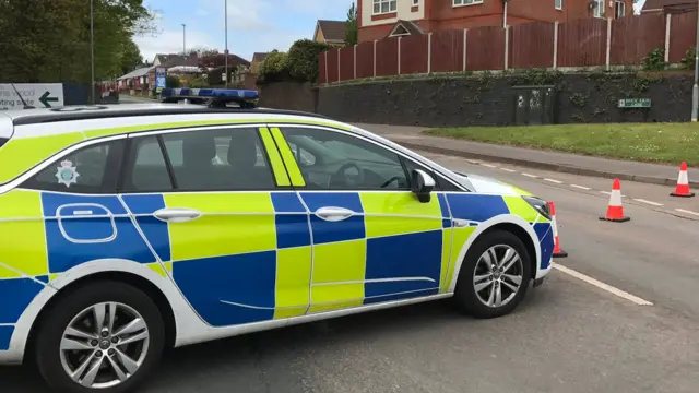 Police car and cones on Shelton New Road