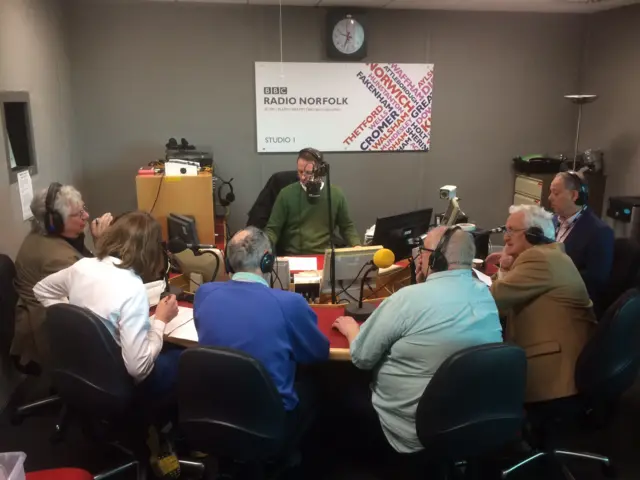 General shot of the radio studio, with all five councillors, radio presenter and Andrew Sinclair