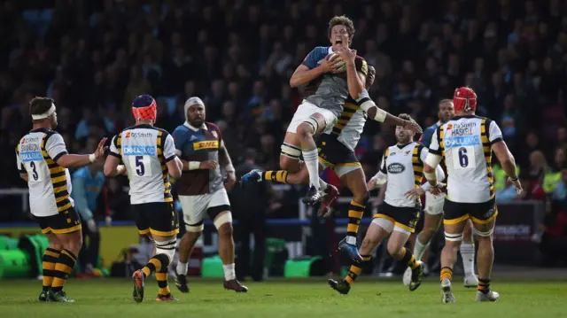 Charlie Matthews of Harlequins wins a kick off