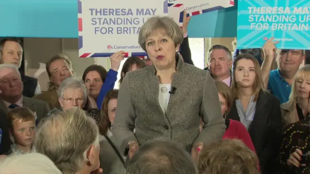 Theresa May campaigning