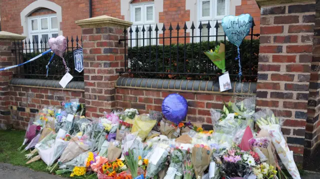 Flowers left outside the family home in Norton, Stourbridge