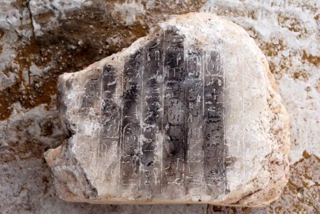 
          An undated handout photo made available on 03 April 2017 by the Egyptian Ministry of Antiquities showing an alabaster block engraved with ten vertical hieroglyphic lines,
        