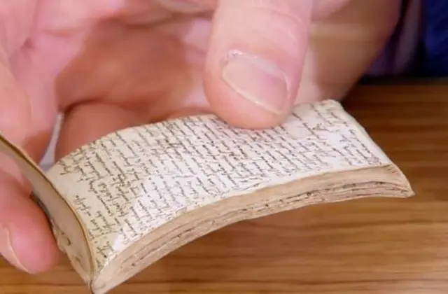 Shakespearean notepad looking small in person's hand