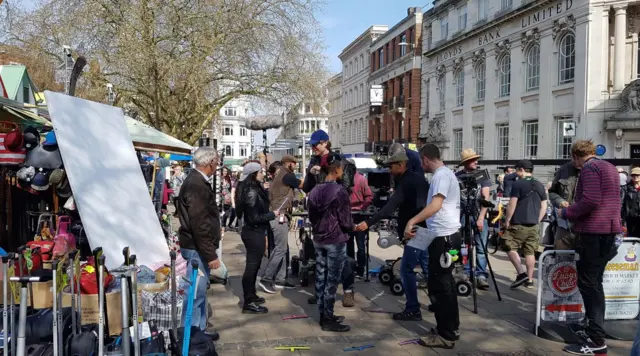 Stephen Merchant, plus film crew, in Gentlemans Walk