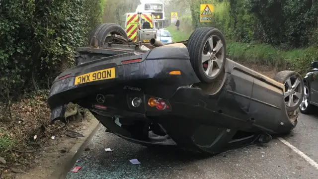 Overturned car between Holbrook and Freston