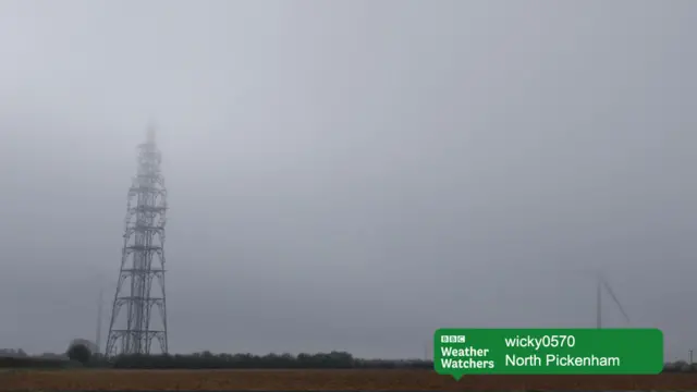 Transmitter and wind turbines in thick mist