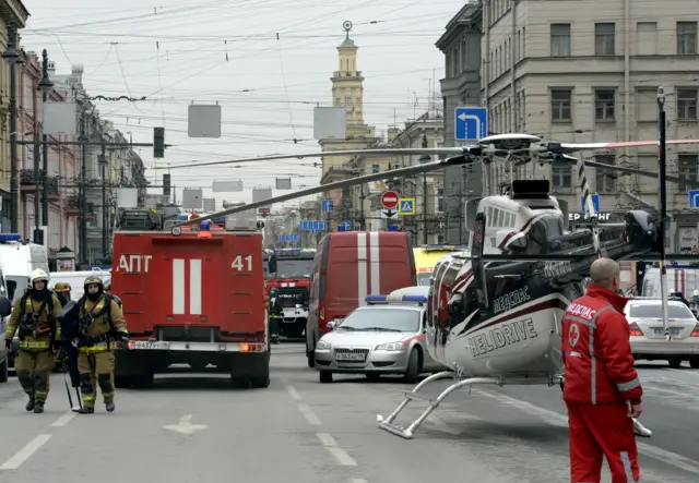 
          A helicopter is seen at the entrance to Technological Institute metro station in Saint Petersburg
        