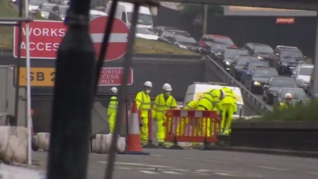 Workmen in the road