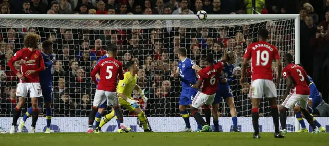 Paul Pogba heads against the bar