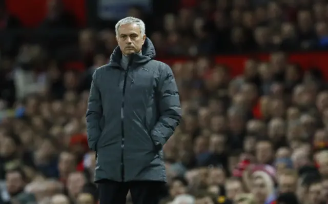 Jose Mourinho watches on