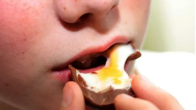 Boy eating Easter egg
