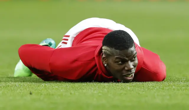 Paul Pogba warms up