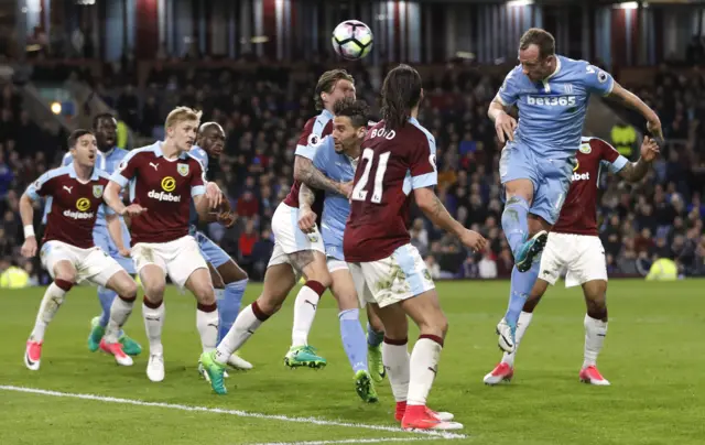 Charlie Adam heads at goal