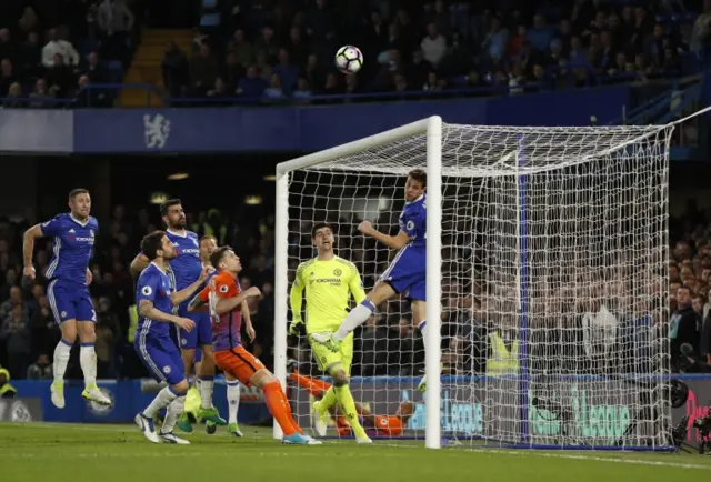 Vincent Kompany heads against the crossbar