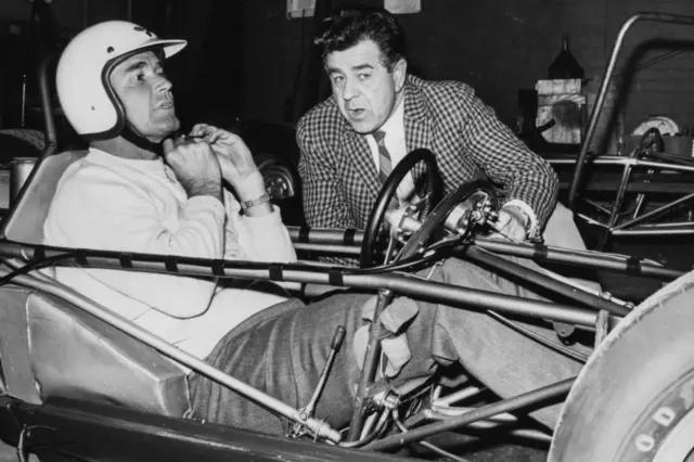 
          Actor James Garner, star of the television show Maverick and later the Rockford Files, was photographed in Norfolk at the wheel of a racing car getting tips from racing driver Jim Russell, at Snetterton drivers school
        