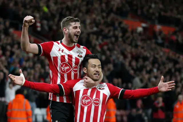 Maya Yoshida celebrates