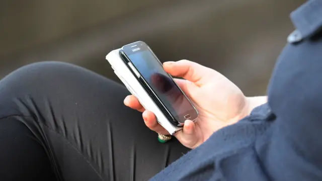 Man using mobile phone